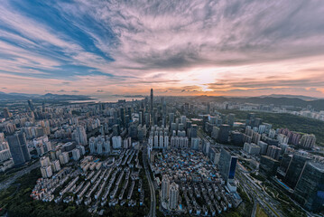 Fototapeta premium Sunset aerial view of Futian skyline in Shenzhen, China