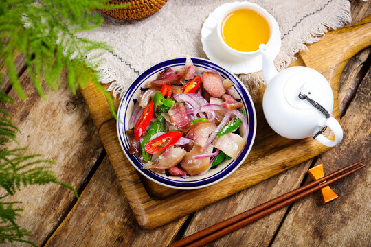 Overhead Pork Salad with Red Onion and Chili on Rustic Wooden Table