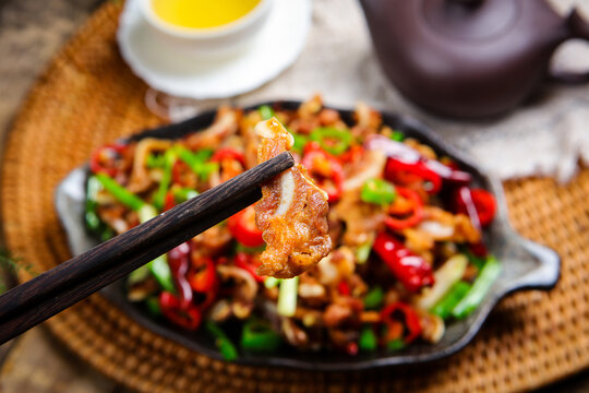 Spicy Stir Fried Pork with Chili Peppers and Chopsticks