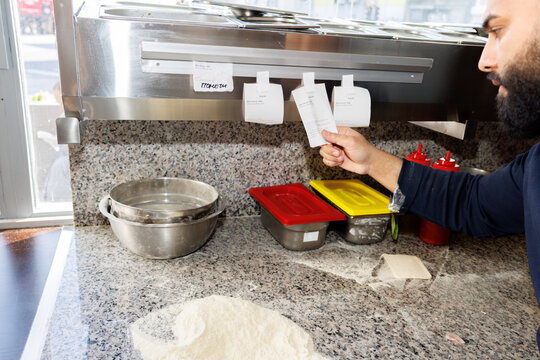 Chef reading orders