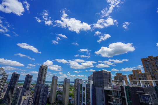 Wuhan City Skyline: Modern High-Rise Complexes Above Clouds