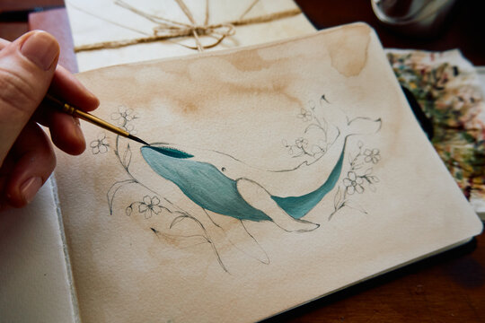 The artistic hand and painting