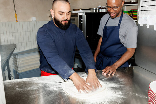 Shaping pizza dough