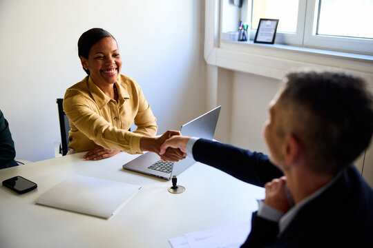 Woman greets a candidate at the interview