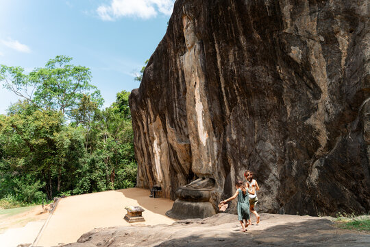 Kids in Buduruwagala the tallest Buddha statue in Sri Lanka
