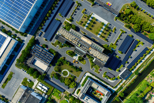 modern factory campus with solar panels and greenery