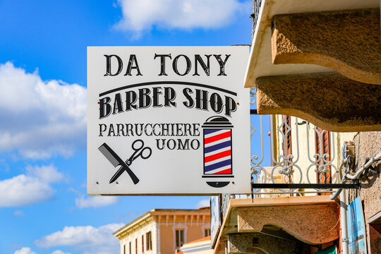 Signboard for a local barbershop named "Da Tony" in La Maddalena, capital city of the eponym archipelago located in the Mediterranean Sea in north-east of Sardinia, Italy