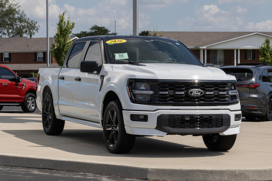 Ford F-150 Lobo 4X4 Supercrew truck at a dealership. Ford offers the F150 Lobo with a 400HP 5.0L Coyote V8 engine. MY:2026