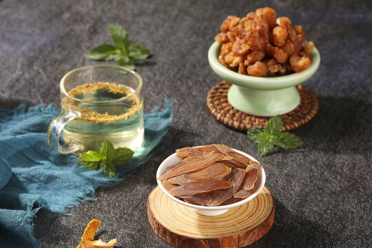 Traditional Chinese Medicine Red Ginseng Slices Herbal Tea Walnuts Natural Health Wellness Display