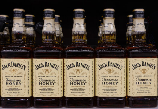 Jack Daniel's Tennessee Honey Whiskey display. Jack Daniel's Tennessee Honey Whiskey is made with honey liqueur and whiskey.