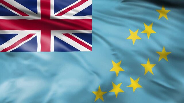 Tuvalu flag waving in wind, union jack in corner, stars on blue, motion footage, bright daylight.
