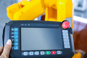 Close Up of Industrial Robot Controller in Factory © PhamHong