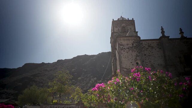 Explore the historic San Javier Mission church set between mountains and an oasis in the desert near Loreto in Baja California