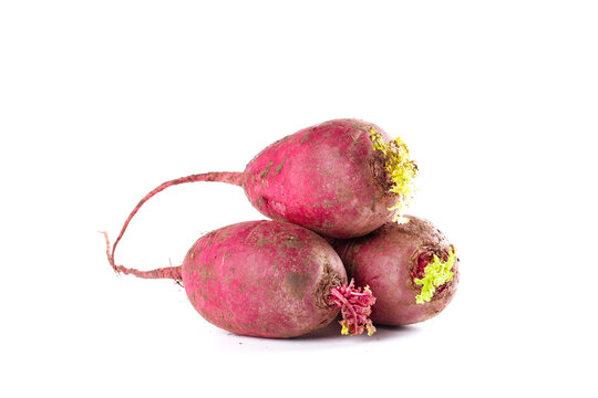 Fresh Purple Radishes from Weifang China - Organic Root Vegetables with Green Sprouts on White Background