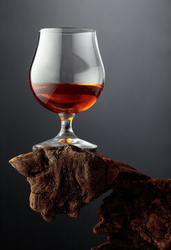 Whiskey on weathered driftwood.