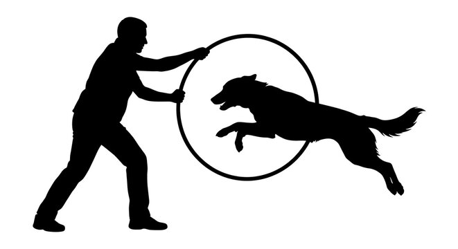 Man training a dog jumping through a hoop silhouette