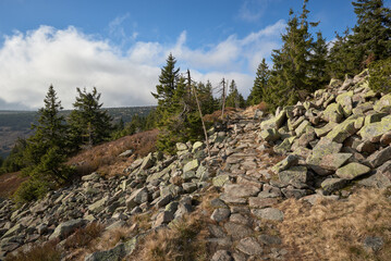 Stone hiking path through mountain boulder field in Krkonose © Milan