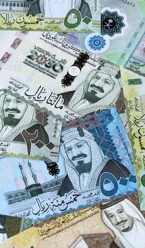 Saudi riyal money bills in pile. Big amount of Saudi Arabia SAR currency cash close up