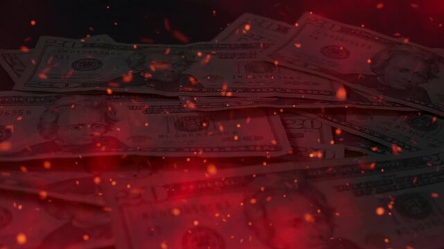 US twenty-dollar bills falling with glowing orange fire sparks, representing inflation, burning money, hot financial markets, or wealth destruction.