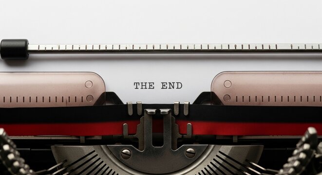 Vintage Typewriter Typing The End in Close Up Macro Shot