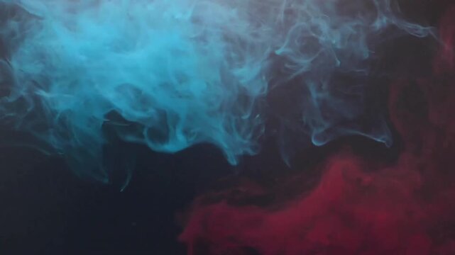 Mesmerizing watercolor abstract smoke blending vibrant blue and crimson hues