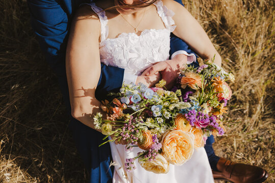 Bride and Groom in a Field