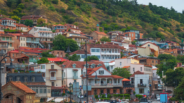 Wide panorama of Old Tbilisi hillside with traditional carved wooden balconies