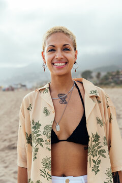 Portrait of beautiful young woman at the beach