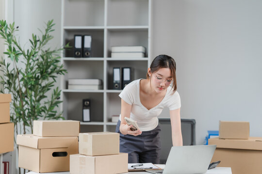 Small business owner managing parcels