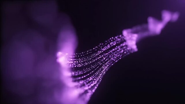 Violet particle stream flowing in darkness