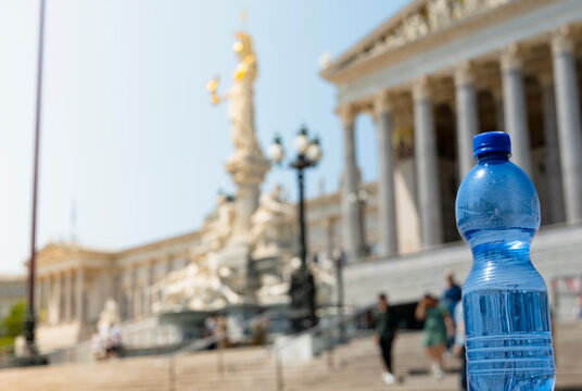 Plastic water bottle placed in front of the Austrian Parliament in Vienna, highlighting increasingly hot heatwave season in Europe