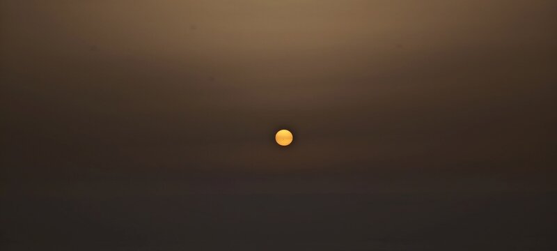 Untergehende Sonne mit Saharastaub auf La Palma