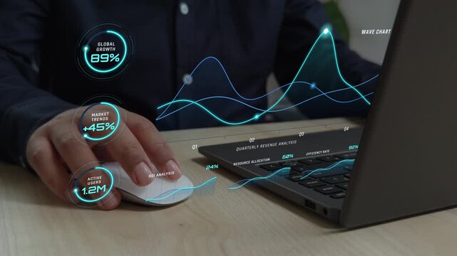 Business person analyzing market trends with futuristic motion graphics overlay data on a laptop