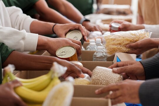 Mandela Day spirit ignites hands packing sustenance for dignity