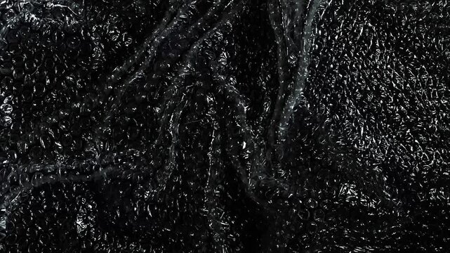 Dark Bubble Wrap Plastic Surface Animation with Transparent Wrinkled Packaging Film, Realistic Protective Material Texture Background for Motion Graphics and Commercial Design