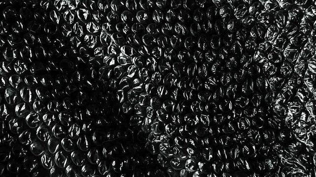 Macro Bubble Wrap Plastic Texture Background Animation with Transparent Protective Packaging Film and Glossy Air Cushion Surface for Motion Graphics and Commercial Design