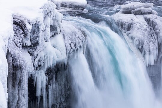 Godafoss waterfall, icy and snowy rock face, Northern Iceland Eyestra, Iceland