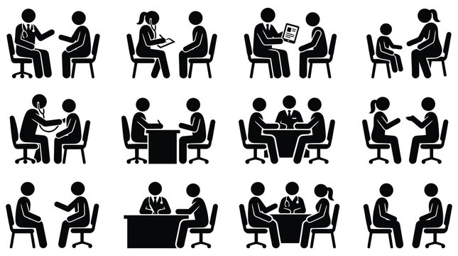 People sitting at desks and tables in office settings