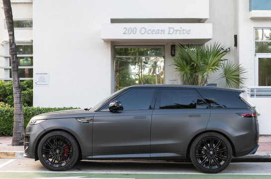 Miami, Florida, USA - July 27, 2025: Luxury SUV car Land Rover. Car Range Rover parked outdoor. Black matte car, corner view. Land Rover Range Rover Sport 2026 SUV car, Stealth Edition