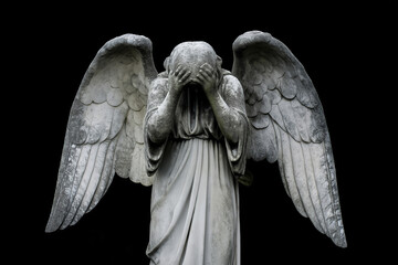 Obraz premium A marble angel statue stands praying beneath on black. Spiritual guardian of faith, devotion, hope, protection, memorial, serenity and religious art. Funeral, burial.