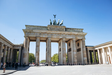Berlin, Germany - April 23, 2026: Front view of the Brandenburg Gate, the iconic neoclassical landmark at Pariser Platz in central Berlin. © Andrei Antipov
