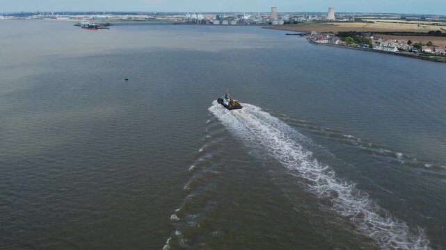 Drone view of a mini dredger carrying out maintenance work on the River Humber. 