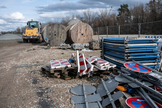 Construction site displaying road signs and equipment