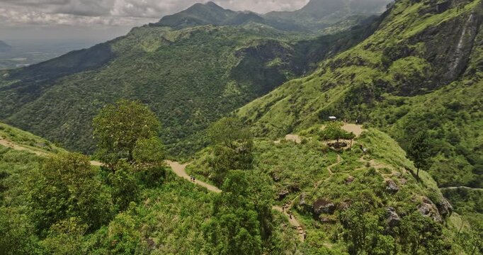 Ella Sri Lanka Aerial v25 panoramic panning view, drone fly around Little Adam's Peak capturing mountainous terrains, verdant valleys and highlands landscape - Shot with Mavic 3 Cine - April 2023