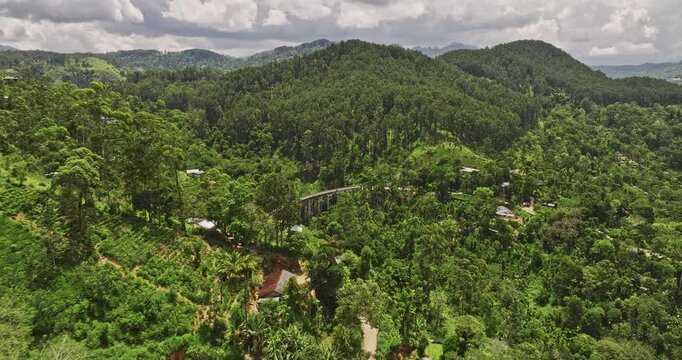 Ella Sri Lanka Aerial v33 cinematic drone flyover capturing the breathtaking views across the Nine Arches Bridge, spanning a lush valley and tea plantations - Shot with Mavic 3 Cine - April 2023