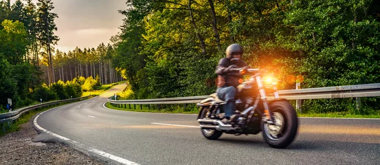 blurred motorbike on the road riding. having fun riding the empty road on a motorcycle tour / journey © AA+W