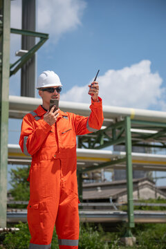Refinery industry, engineer working in industrial production, oil and gas refinery plant industry factory.