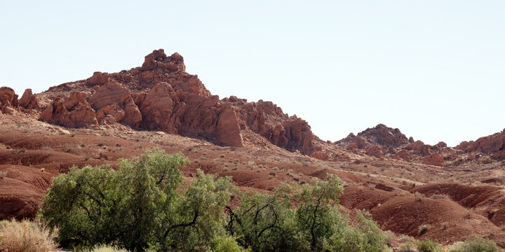 Panorama of dawn light on iconic red Aztec sandstone formations at Valley of Fire State Park in Nevada