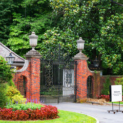 Obraz premium Formal Entrance To Hillwood Estate Museum And Gardens With Ornamental Iron Gates Washington DC