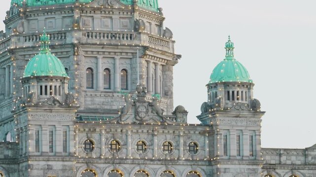 Victoria, BC, Canada &ndash; July 8, 2026: Illuminated copper domes of British Columbia Parliament Buildings